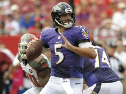 Joe Flacco estuvo casi perfecto al pasar306 yardas y cinco touchdowns. AP / S. Nesius