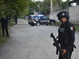 Policía Ministerial estableció filtros de revisión en diferentes puntos de acceso y salidas de Chilpancingo. AFP / Y. Cortez