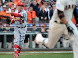 Brandon Crawford aprovecha el error del relevista Randy Choate para anotar la carrera del gane. AFP / H. How