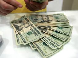 El precio del dólar aumento 14 centavos comparado con los indicadores de ayer martes. EL INFORMADOR / ARCHIVO