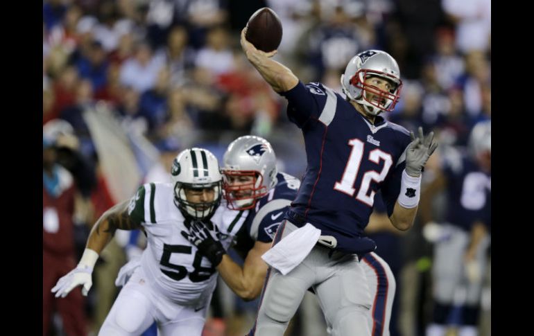 Tom Brady lanzó para 261 yardas y tres pases de anotación. AP / C. Krupa