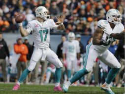 El mariscal de campo Ryan Tannehill lanza dos pases para touchdown y acumula 277 yardas. AP / N. Huh