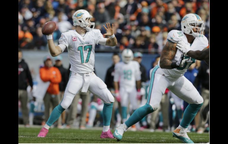 El mariscal de campo Ryan Tannehill lanza dos pases para touchdown y acumula 277 yardas. AP / N. Huh