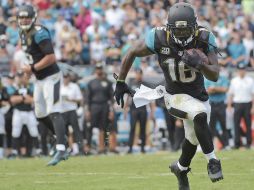 Denard Robinson acumuló 127 yardas por tierra, la máxima cifra de su vida. AP / P. Ebenhack