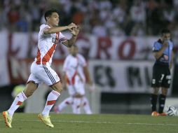 El colombiano Teófilo Gutiérrez, goleador líder de la temporada, celebra su segundo gol en contra de Belgrano. AFP / A. Pagni