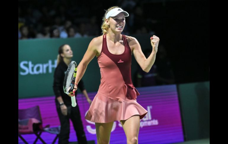 Wozniacki, de 24 años, tuvo problemas en el primer set, pero en el segundo se mostró mucho más convincente. AFP / R. Rahman