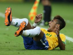 Neymar, la gran estrella de la Verdeamarella, utiliza aretes y gorras en muchas de sus presentaciones oficiales. AP / ARCHIVO