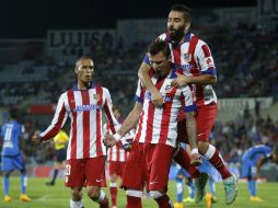 Este triunfo acercó a los Colchoneros a los primeros lugares. AP / A. Kudacki