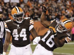 Andrew Hawkins festeja haber rescatado la victoria. AP / T. Dejak