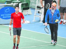 Con un verdadero maestro. Novak Djokovic (izq.) es entrenado por el alemán ex número uno mundial, Boris Becker (der.), de 46 años. AFP / M. Medina