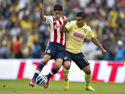 Ángel Reyna y Osvaldito Martínez. Los dos creativos  cumplieron labores de sacrificio durante el partido de ayer en el Estadio Azteca. MEXSPORT / O. Martínez