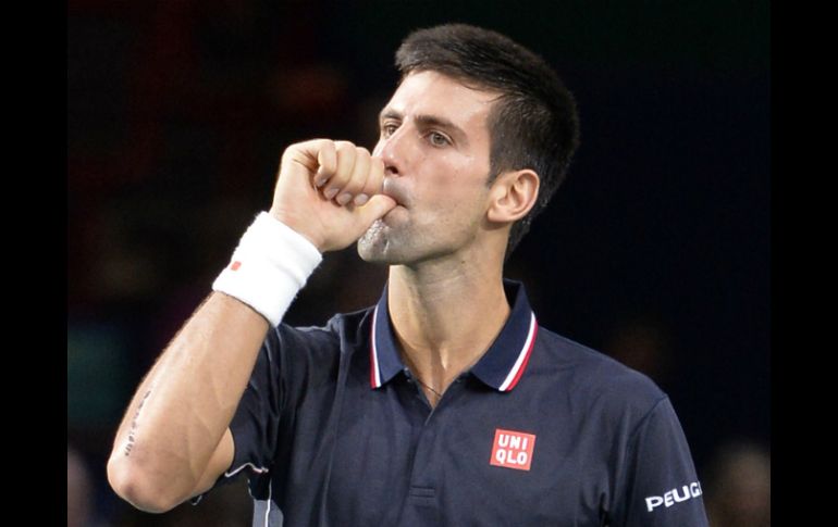 Novak tendrá que ganar tres juegos para cerrar el 2014 como número uno. AFP / M. Medina