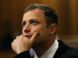 Pistorius fue exonerado del cargo de posesión ilegal de armas. AFP / S. Sibeko