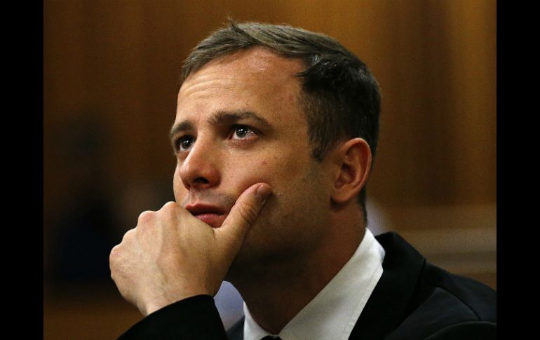 Pistorius fue exonerado del cargo de posesión ilegal de armas. AFP / S. Sibeko