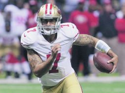 Colin Kaepernick suma sólo 12 pases de anotación en 8 juegos de la presente campaña, mientras que en 2013 consiguió 21 en 16. AP / B. Harber