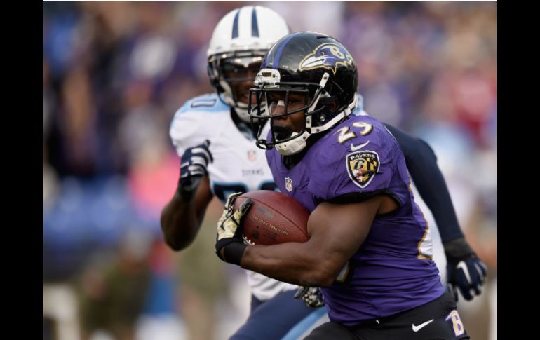 Justin Forsett corre para 112 yardas y dos touchdowns para respaldar la sólida actuación defensiva de su equipo. AFP / P. Smith