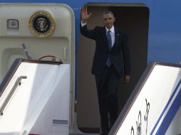 Barack Obama a su llegada al Aeropuerto Internacional de Beijing. AP / N. Han Guan