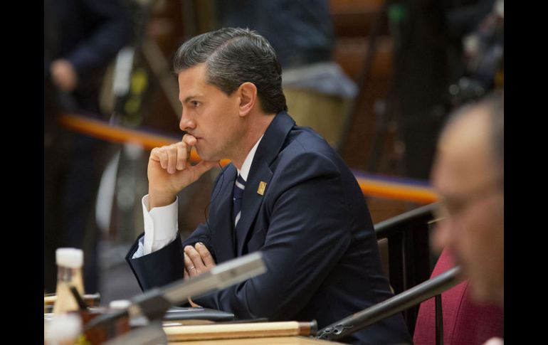 El presidente de México, Enrique Peña Nieto, durante su participación en la APEC. AFP / P. Monsivais