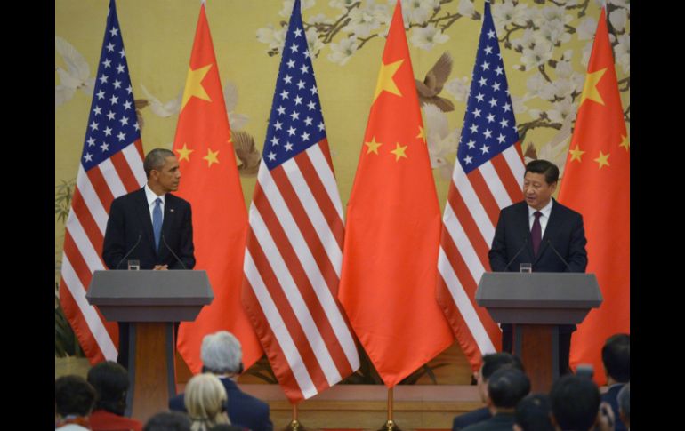 Barack Obama (i) y Xi Jinping (d) en una conferencia de prensa en Beijing. AFP / M. Ngan