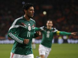 Carlos Vela regresa al Tri con dos goles luego de más de tres años de no vestir la playera verde. AP / P.Dejong