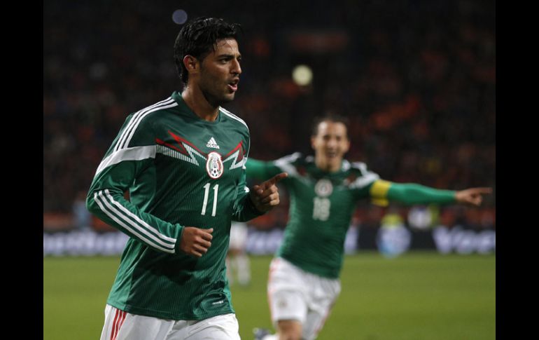 Carlos Vela regresa al Tri con dos goles luego de más de tres años de no vestir la playera verde. AP / P.Dejong