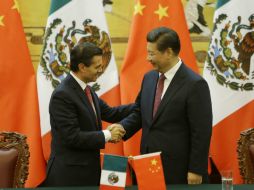 Tras su gira de trabajo por China, Peña Nieto viajará a Brisbane, Australia para participar en el G-20. AP / J. Lee