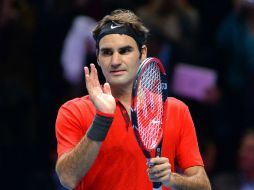 Roger Federer (foto) salvó ayer cuatro bolas de partido en el tercer set ante Stan Wawrinka. AFP / G. Kirk