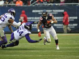 El running back de Chicago, Matt Forte, aporta 117 yardas terrestres. AFP / D. Banks