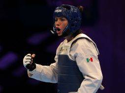 María del Rosario Espinoza se coronó como flamante campeona de los JCC 2014. EFE / A. Cruz