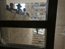 Este martes dos palestinos armados con una pistola y cuchillos irrumpieron en la sinagoga y mataron a cuatro israelíes. EFE / J. Hollander