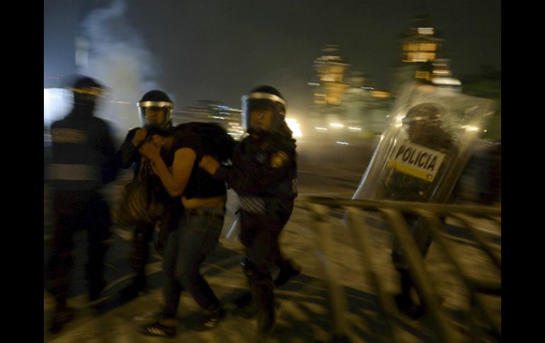 Manifestaciones de repudio a la desaparición forzada de los 43 normalistas de Ayotzinapa. AFP / A. Estrella