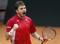 Wawrinka, número cuatro del mundo, logra un trabajoso triunfo en un partido que comenzó cómodo. EFE / Y. Valat