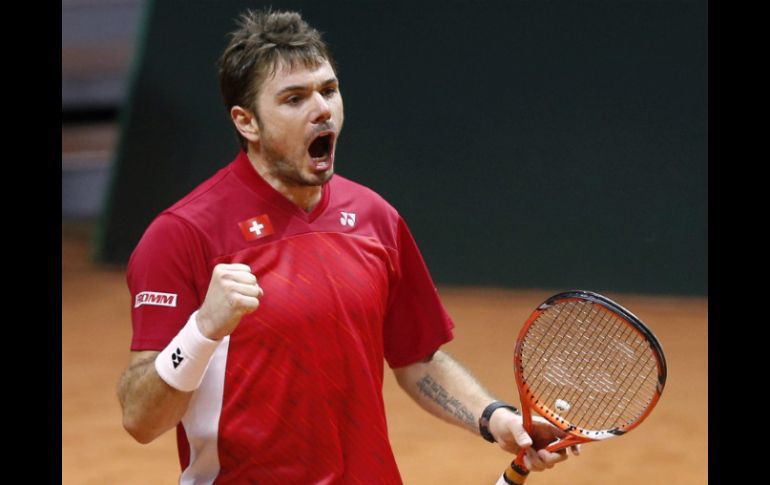 Wawrinka, número cuatro del mundo, logra un trabajoso triunfo en un partido que comenzó cómodo. EFE / Y. Valat