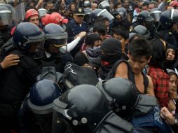 Ocho hombres son trasladados al Cefereso de Veracruz y tres mujeres a Nayarit, donde continuarán su proceso penal. EFE / P. Salazar