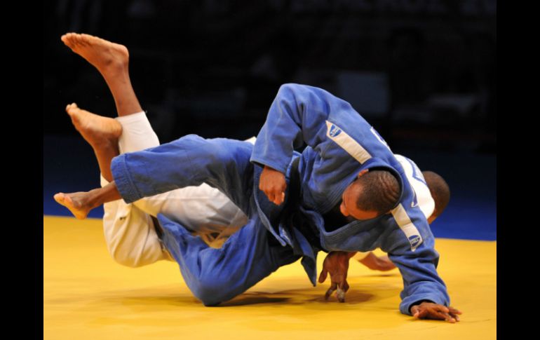 El cubano, naturalizado mexicano y vestido de azul, ya había ganado para México el oro en los juegos del 2010. MEXSPORT / L. Monroy