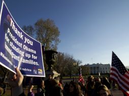 'Gracias, presidente Obama por apoyar a las familias de inmigrantes', dice esta pancarta en apoyo a la propuesta. AP / J. Magana