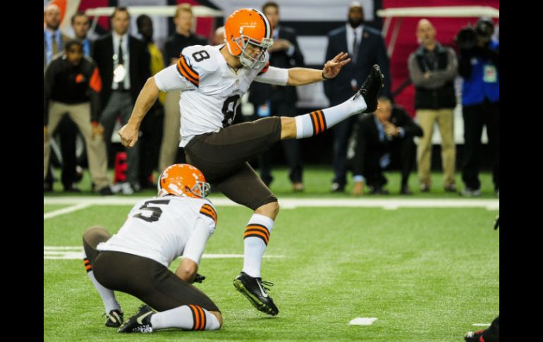 El pateador Billy Cundiff acierta luego de su cuarto gol de campo del juego para conseguir el triunfo. AFP / S. Cunningham