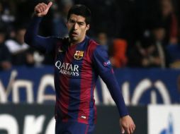 Suárez anota después de un mes de debutar con el Barsa. AFP / T. Coex