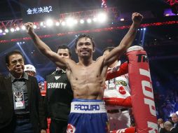 Manny Pacquiao tiene registro de 57 victorias (KO38), cinco derrotas (KO3) y dos empates. AP / K. Cheung