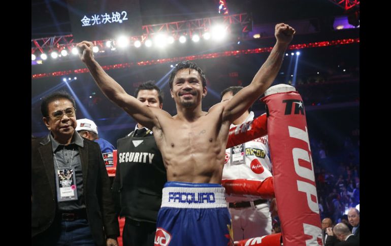 Manny Pacquiao tiene registro de 57 victorias (KO38), cinco derrotas (KO3) y dos empates. AP / K. Cheung