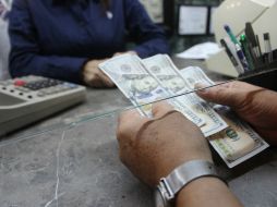 Banxico fija el tipo de cambio para obligaciones en moneda extranjera en 13.7219 pesos. EL INFORMADOR / ARCHIVO