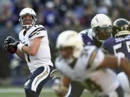 Rivers encuentra a Royal para coronar una marcha de 80 yardas que lleva a los Cargadores a su tercer victoria en fila. AP / G. Burton