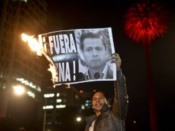 Los dos años de presidencia que acaba de cumplir Peña Nieto coinciden con una profunda crisis social en México. AFP / Y. Cortez