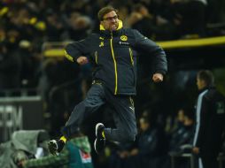 El estratega del Dortmund, Jürgen Klopp, festejó con rabia el gol del Borussia. AFP / P. Stollarz