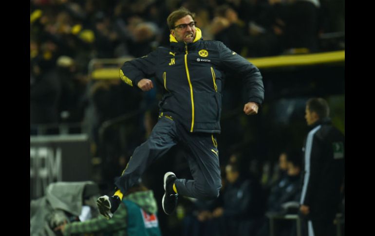 El estratega del Dortmund, Jürgen Klopp, festejó con rabia el gol del Borussia. AFP / P. Stollarz