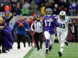 Jarius Wright logra una recepción para touchdown de 87 yardas. AFP / H. Folsien