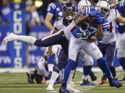 Reggie Wayne rebasa a Peyton Manning con el mayor número de partidos y victorias en la historia de la franquicia de los Potros. AFP / M. Hickey