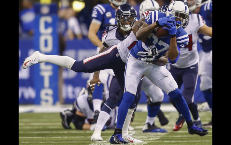 Reggie Wayne rebasa a Peyton Manning con el mayor número de partidos y victorias en la historia de la franquicia de los Potros. AFP / M. Hickey