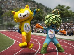 Las mascotas ya están listas para la máxima justa deportiva. AFP / F. Dana