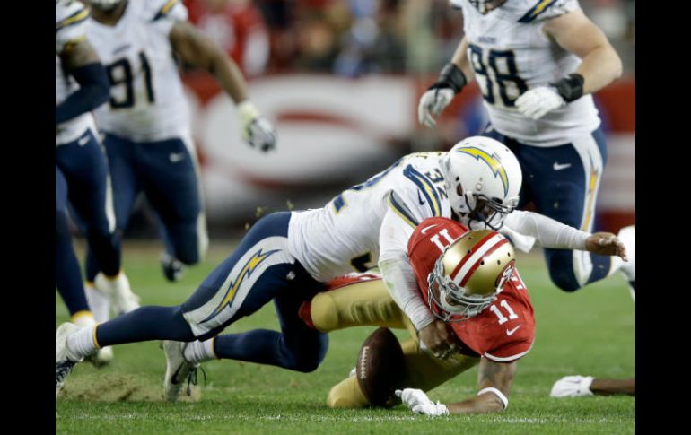 Eric Weddle provocó un balón suelto de Quinton Patton, el inicio de la ofensiva que terminó con la victoria de San Diego. AFP / E. Shaw